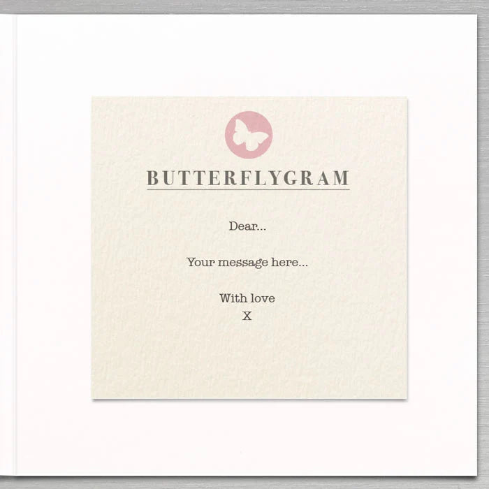 A square cream-colored card with a textured paper finish, featuring a pink butterfly logo and the text 'BUTTERFLYGRAM' with a placeholder message. The card is presented on a white backing card against a light gray background.
