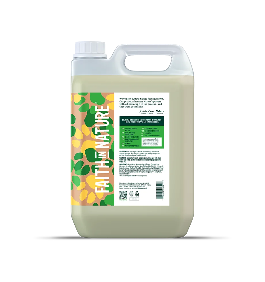 A large plastic jug of Faith & Nature dog shampoo with a white cap and handle, featuring a colorful label with green leaves and yellow/orange graphics, shown on a white background.