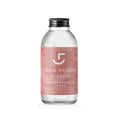 A bottle of branded 'good human' rose water. 