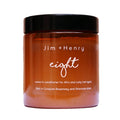 An amber jar of Jim+Henry_Leave-In-Conditioner