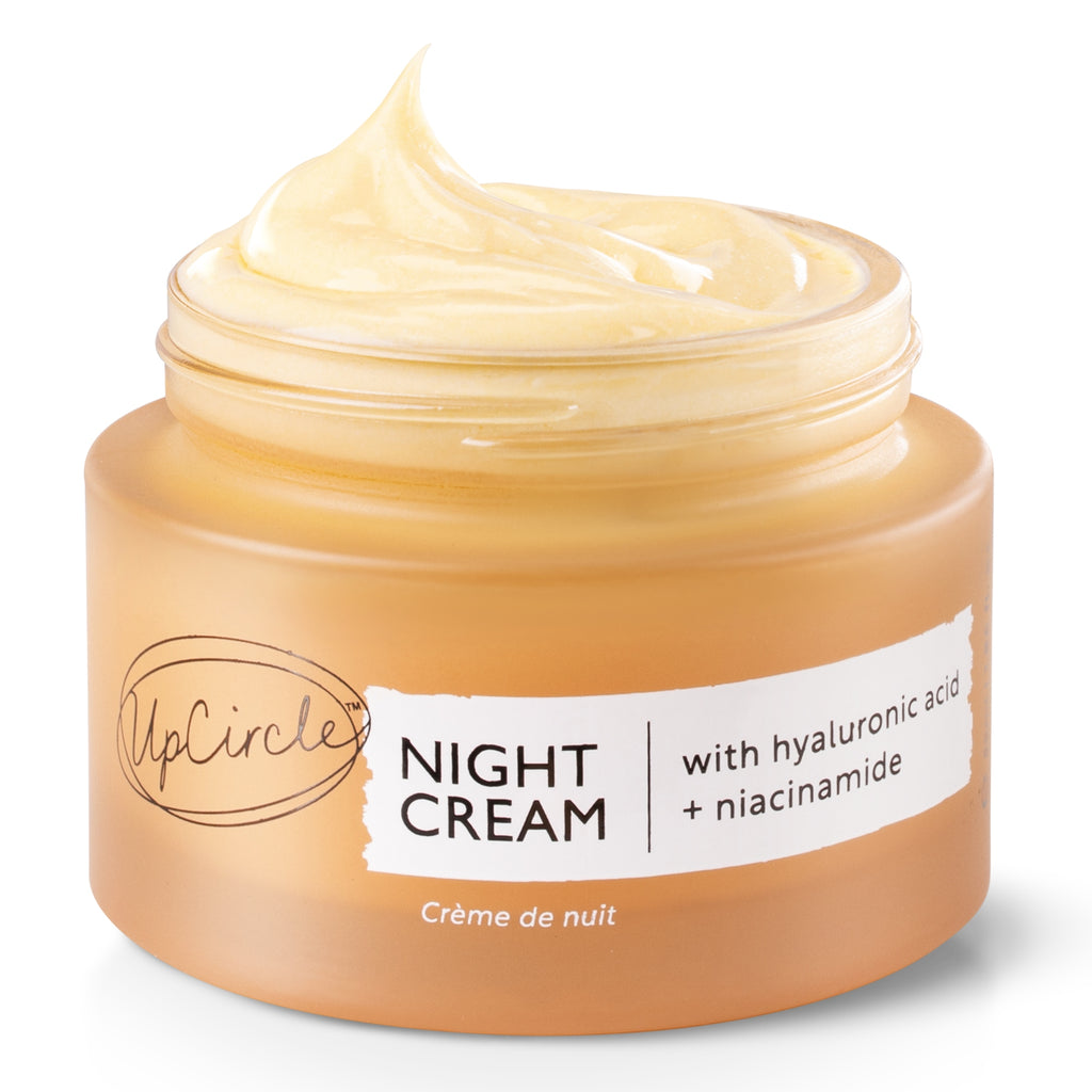 Jar of night cream with visible brand label on a white background