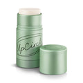 Green UpCircle refillable deodorant with white cap on a white background