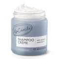 Jar of UpCircle Shampoo Crème with a white lid on a white background