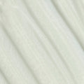 A close-up texture shot of a cream-colored fabric with a subtle, fine woven pattern and soft diagonal folds.