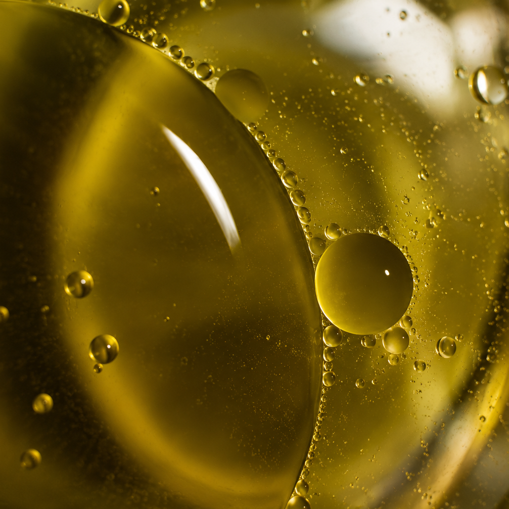 This close up shows the texture of organic olive oil. 