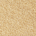 This close-up photograph displays a visually appealing collection of tiny amaranth seeds filling the entire frame. 