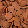 A close-up shot of Montezuma's organic chocolate buttons filling the entire frame.