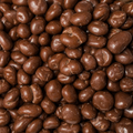 Organic Dark Chocolate Coated Raisins, filling the entire frame. 