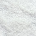 A close-up texture shot of white coarse salt crystals filling the entire frame.