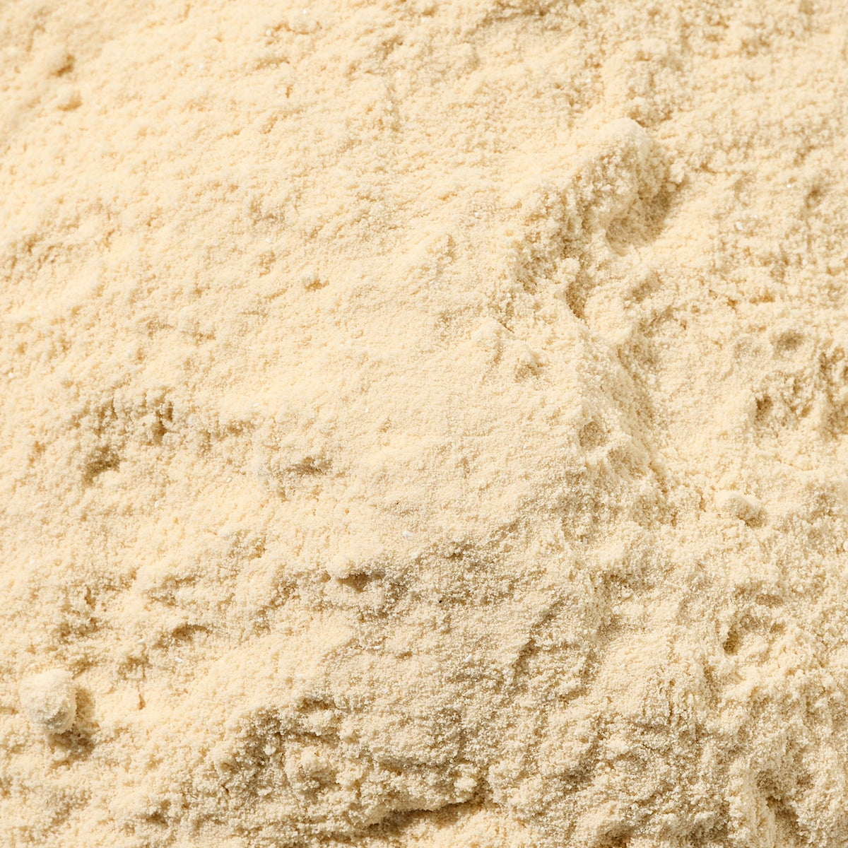 A close up shot of dried fenugreek spice, filling the entire frame. 