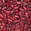 A close-up shot showcases an abundance of red kidney beans. 