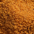 A close up captures coarse brown sugar filling the entire frame. 