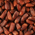 Macro Shot, from straight down of pitted Dates. 