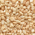 An extreme close-up shot showcases the detailed texture of crispy rice cereal puffs. 