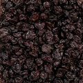 An image of dried sour cherries, filling the frame. 