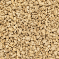 A close-up shot of organic sunflower mince, filling the entire frame.
