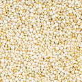 This photo presents a close-up view of small, round, white quinoa seeds that completely fill the frame.