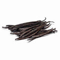 Dark brown vanilla beans on a white background