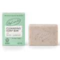 UpCircle Cleansing Soap Bar with fennel and cardamom beside its mint green product box on a white background